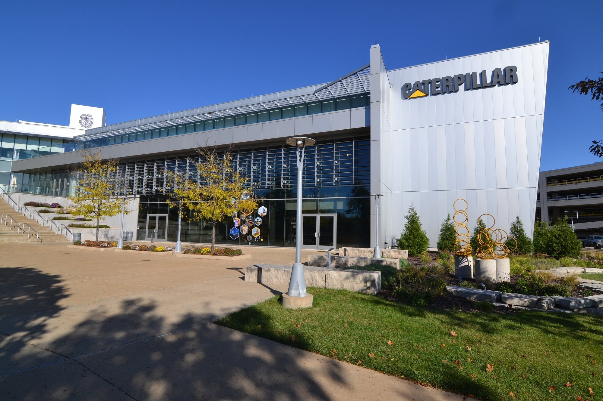 The angular silver exterior of the Caterpillar Visitors Center in downtown Peoria, Illinois.