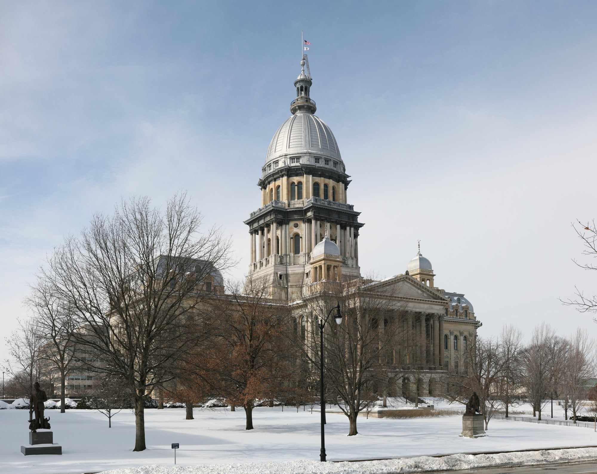 The Illinois State Capitol and its silver dome rise above the grounds in Springfield, Illinois.