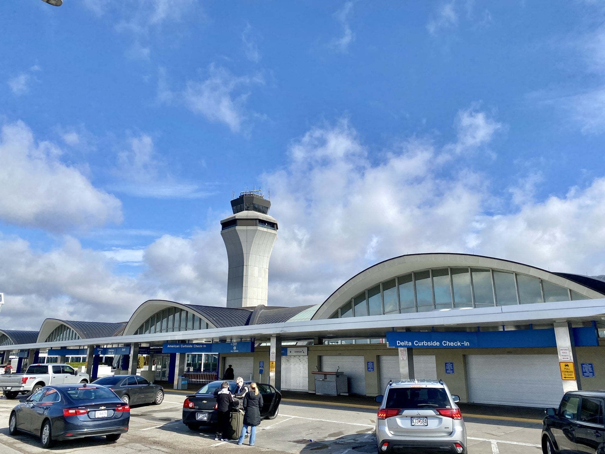 Cars stopped at the check-in lane outside Terminal 1 at St. Louis Lambert International Airport