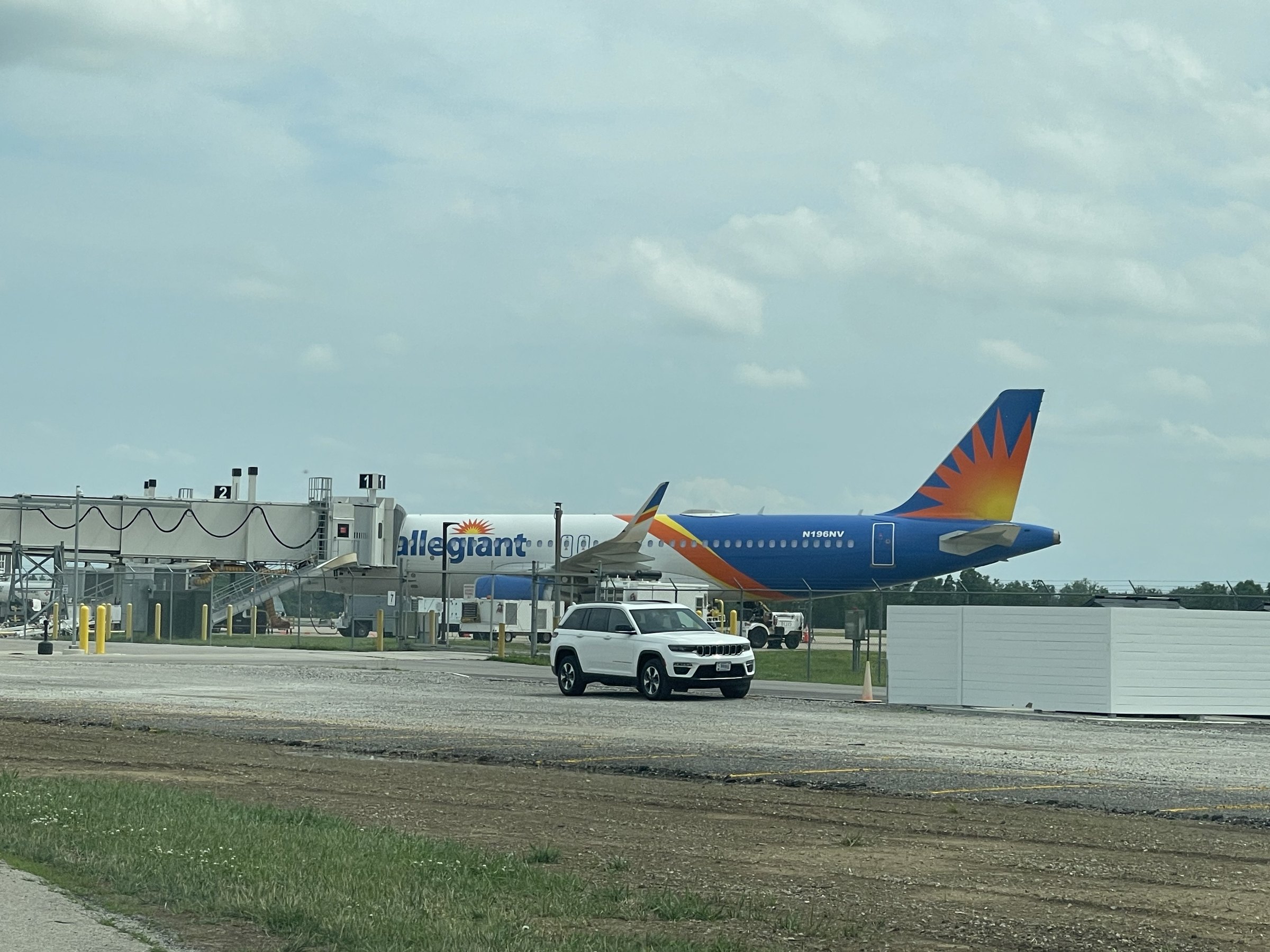 An Allegiant Air jet parked at the boarding bridges of the passenger terminal at MidAmerica St. Louis Airport in Mascoutah, Illinois