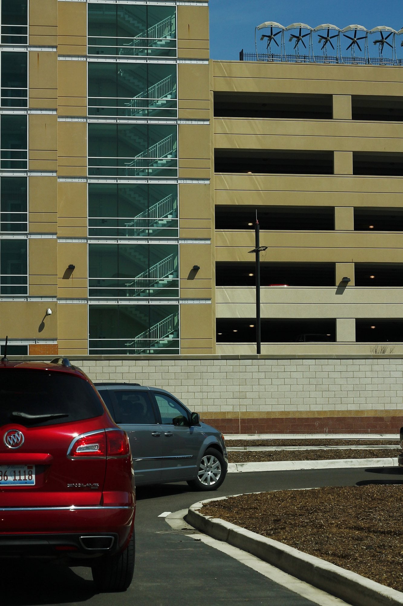 Cars leaving the multi-story parking and rental car garage at Chicago Midway International Airport