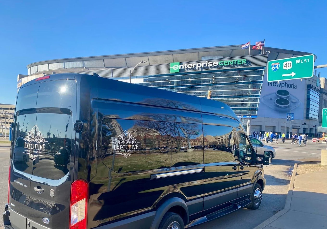 Black Executive Transportation passenger van outside Enterprise Center in St. Louis