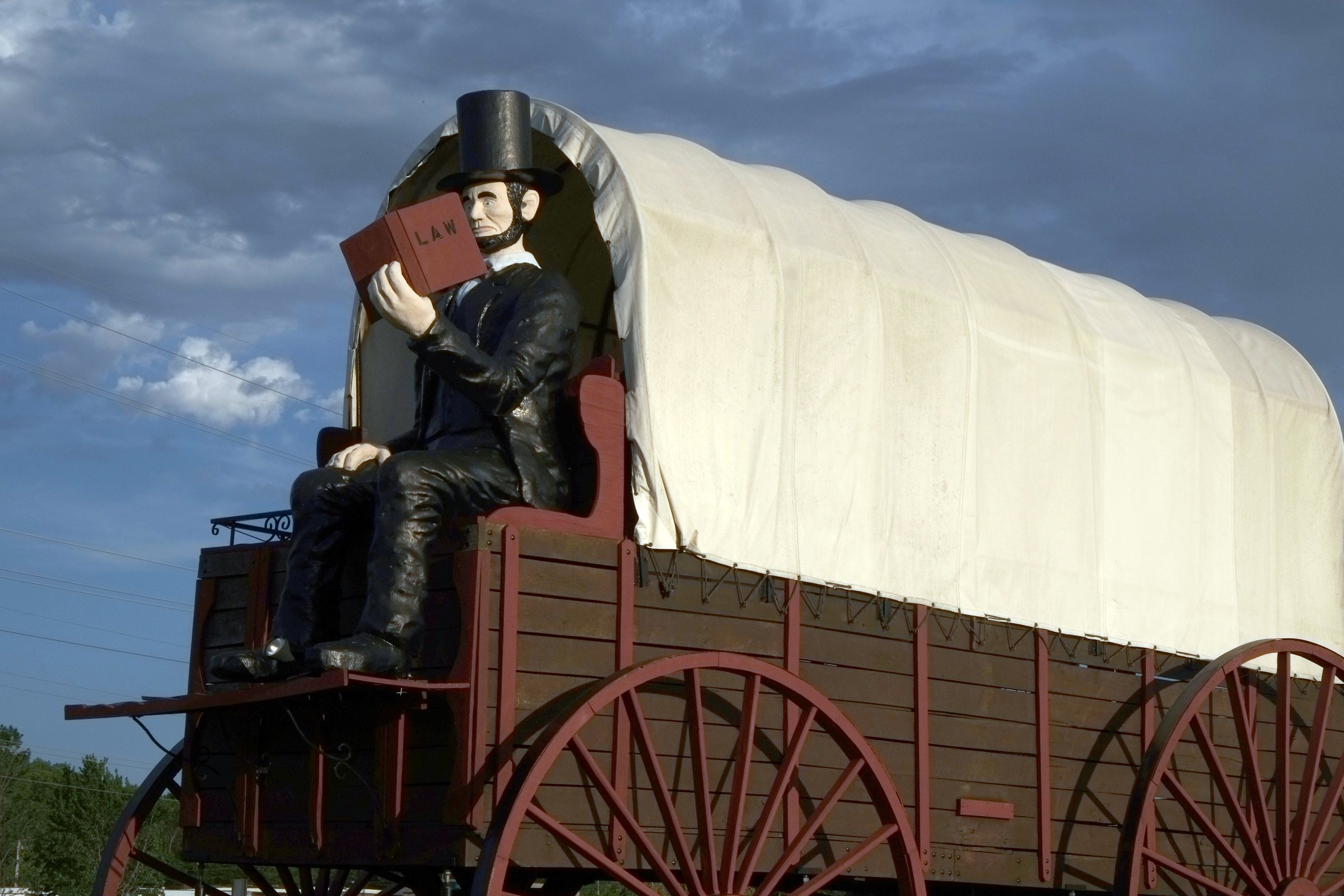 The Railsplitter Covered Wagon and its Abraham Lincoln statue on Historic Route 66 in Lincoln, Illinois